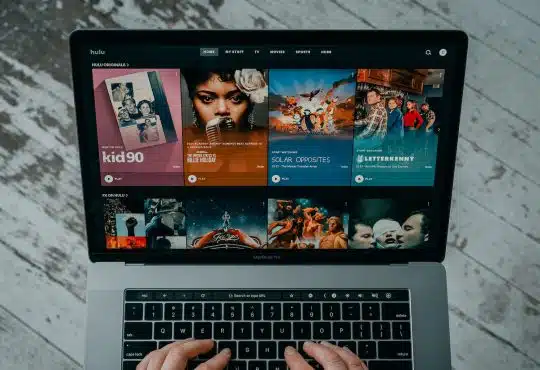 macbook pro on white table
